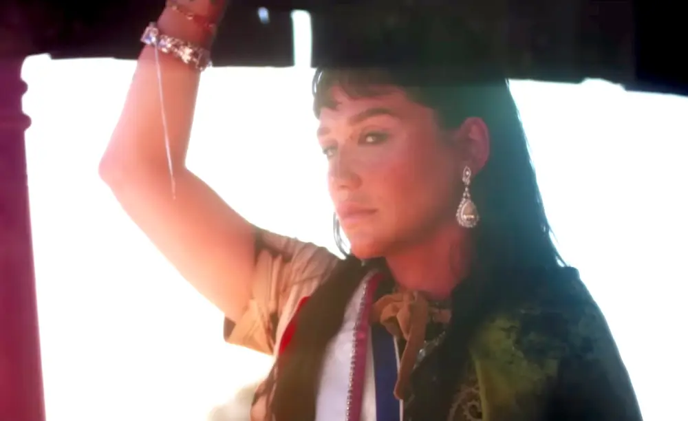 Screenshot from Kesha's music video "High Road"