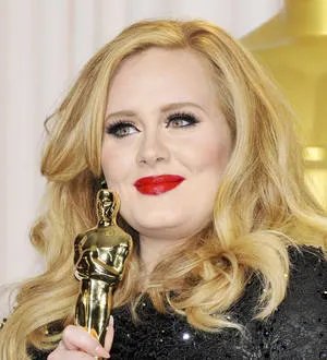 Adele dresses up as George Michael for birthday