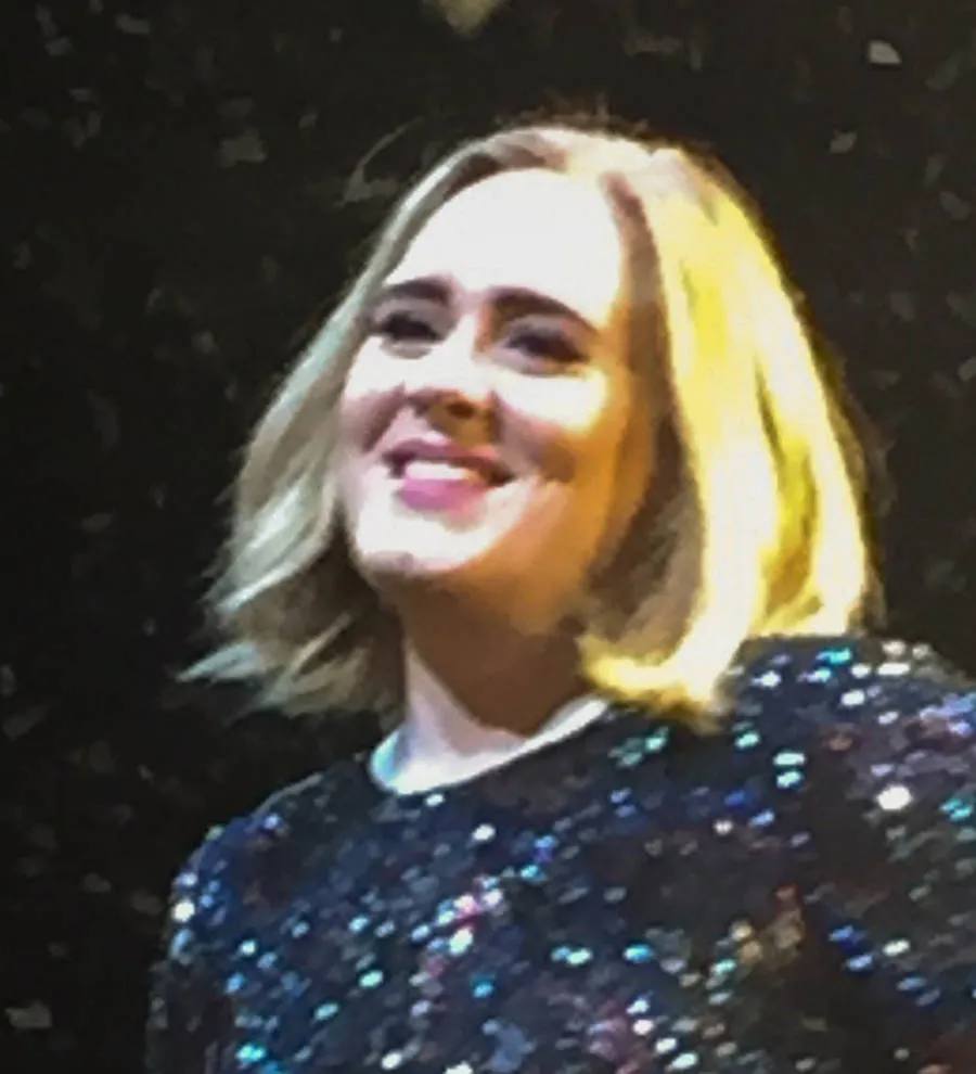 Adele honors slain Belgians at London gig