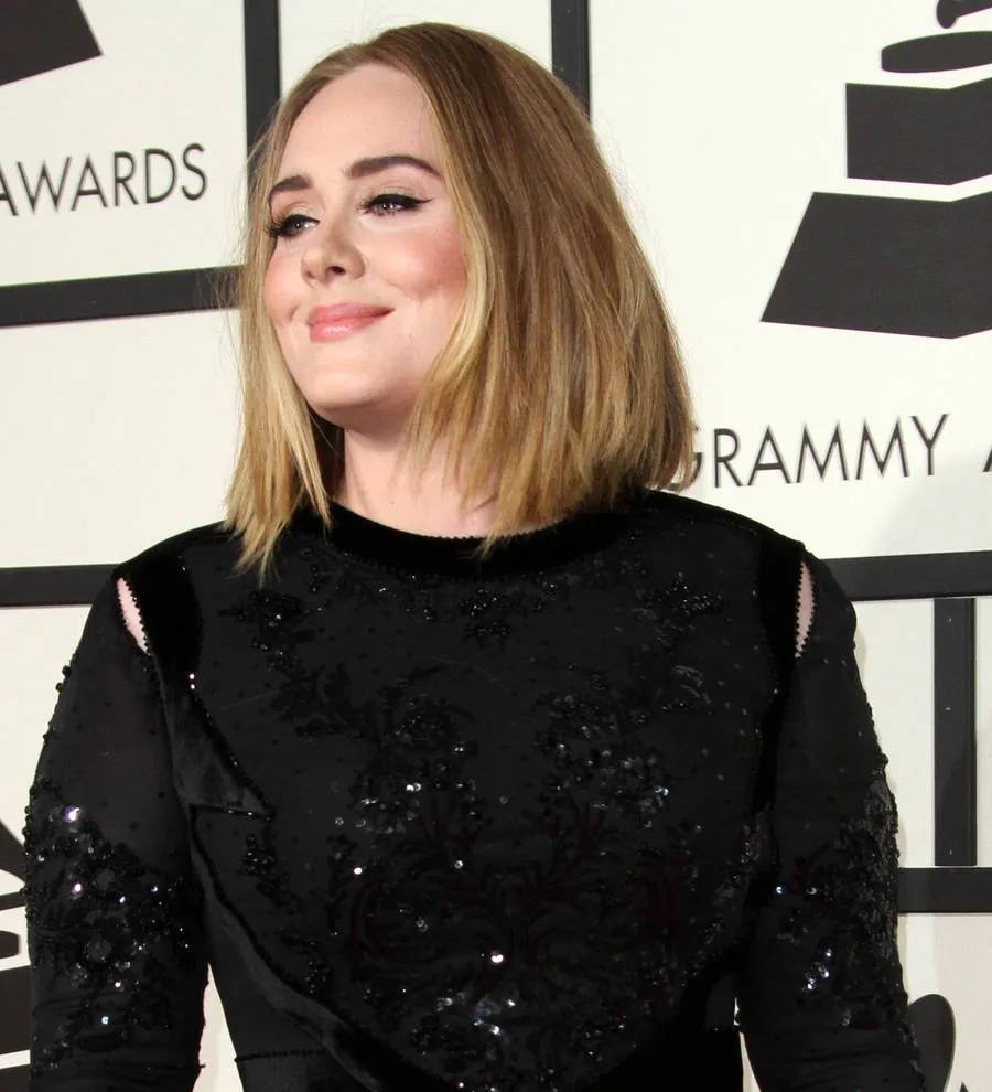 Adele back on top despite Grammys gaffe