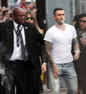 Adam Levine sugar-bombed outside TV studio