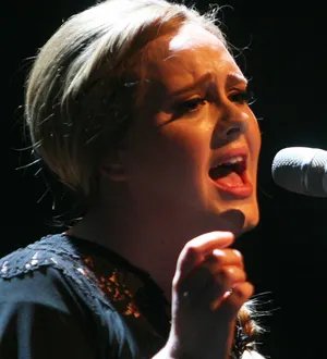 Adele back on top as Rihanna makes history with 20th top 10