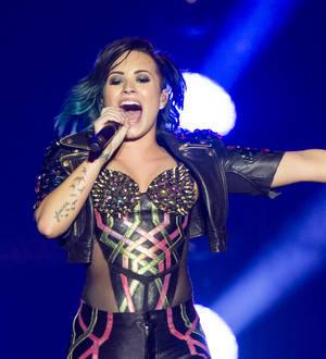 Demi Lovato fighting illness on tour