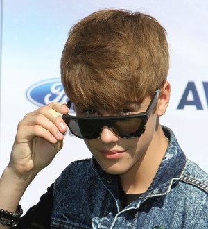 Justin Bieber surprises at rap concert