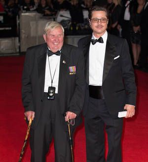 Brad Pitt escorts World War Two veteran to Fury red carpet