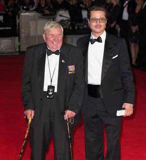 Brad Pitt escorts World War Two veteran to Fury red carpet