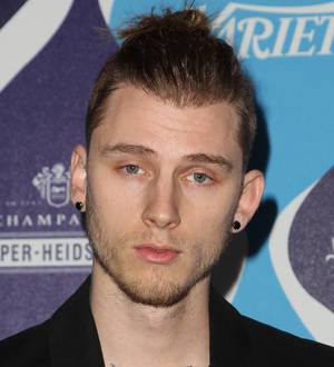 Machine Gun Kelly struggling to cope with attention surrounding Amber Rose relationship