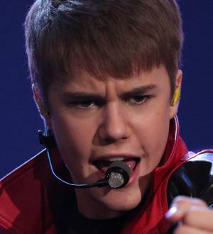 Justin Bieber hands Japan gig profits to tsunami relief