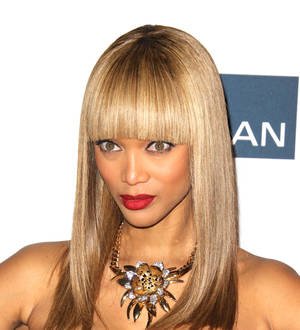 Tyra Banks sues wig companies for million