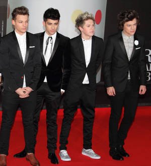 One Direction ask fans to go orange for Amsterdam gig
