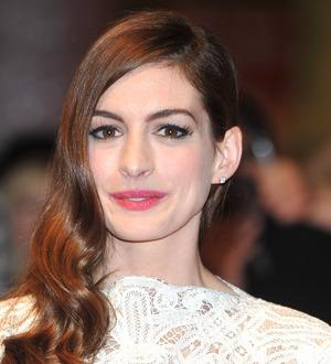 Hathaway cuts off flowing locks