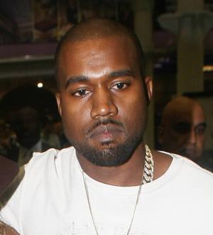 Kanye West respects French paparazzi for keeping quiet on the job