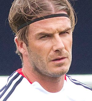 David Beckham pelted with beer can