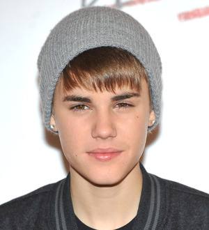 Justin Bieber is coming to town as Santa's little helper