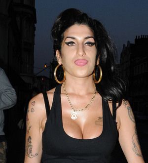 Amy Winehouse awards postponed until 2013