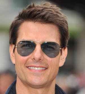Tom Cruise takes helicopter to soccer game
