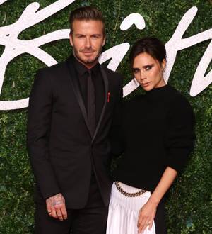 Victoria Beckham and Emma Watson win British Fashion Awards