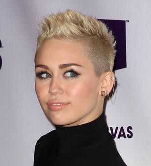 Miley Cyrus lectured Justin Bieber at movie premiere
