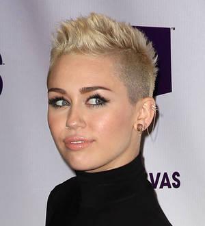 Miley Cyrus lectured Justin Bieber at movie premiere