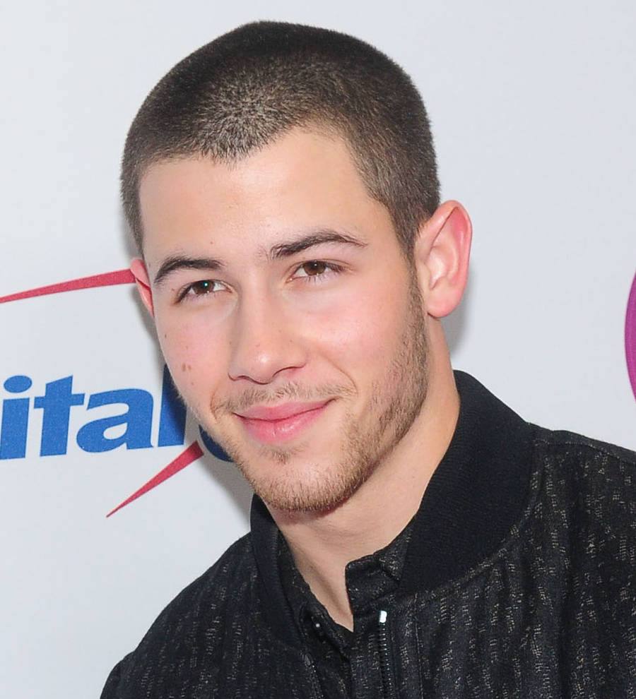 Nick Jonas charmingly evades Lily Collins romance questions