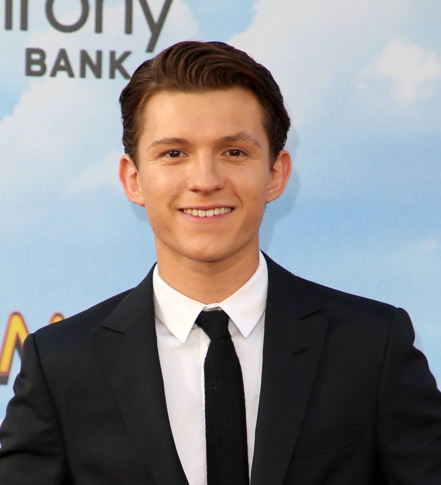 Tom Holland's brother gatecrashes his interview at Spider-Man premiere