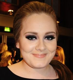 Adele tops iTunes album and singles charts
