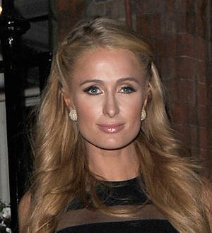 Paris Hilton's neighbors robbed at gunpoint