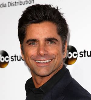 John Stamos checks into rehab