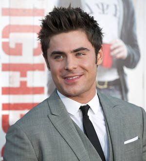 Zac Efron pictured kissing Michelle Rodriguez