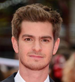 Andrew Garfield dons Spider-Man suit to visit children's charity
