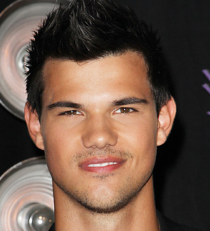 Taylor Lautner too busy to enjoy success