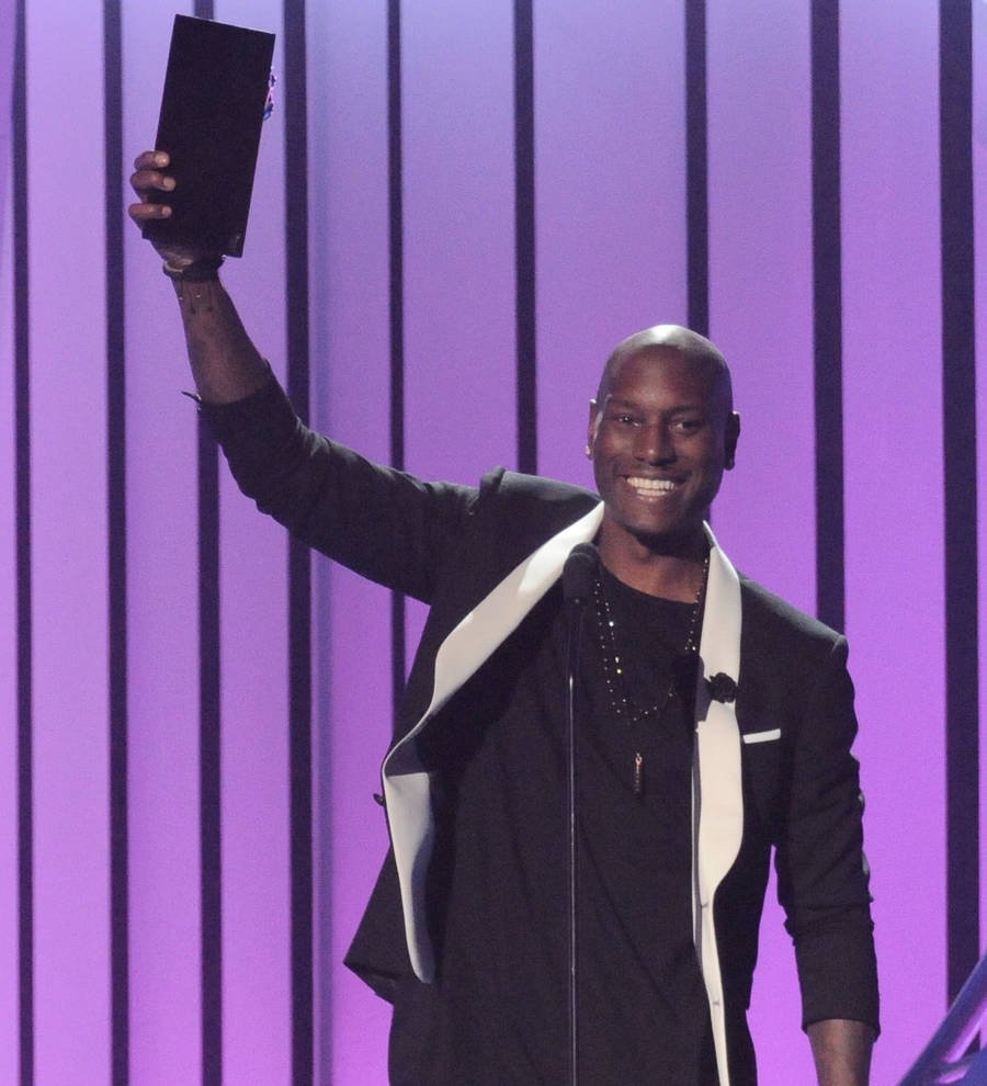 Tyrese Gibson flirted his way to Charlize Theron's digits