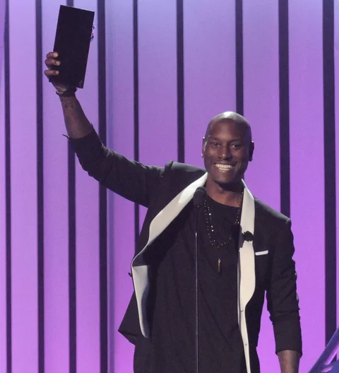 Tyrese Gibson flirted his way to Charlize Theron's digits