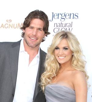 Carrie Underwood advises Miley Cyrus to have long engagement