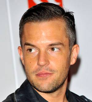 Brandon Flowers: 'Picking up kids wrecked my shoulder'