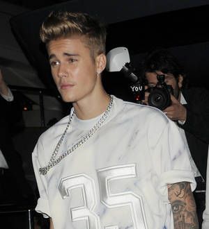 Justin Bieber escapes unharmed from paparazzo car chase crash