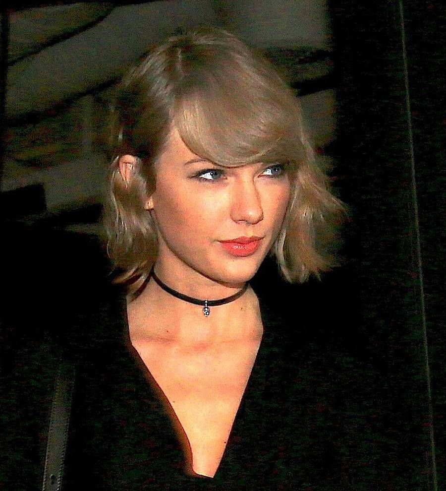Taylor Swift and Tom Hiddleston can't keep their hands to themselves