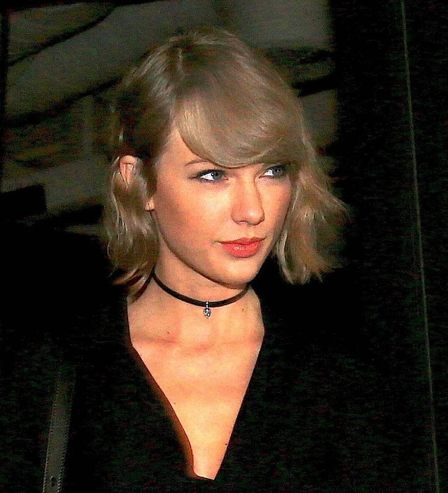 Taylor Swift and Tom Hiddleston can't keep their hands to themselves