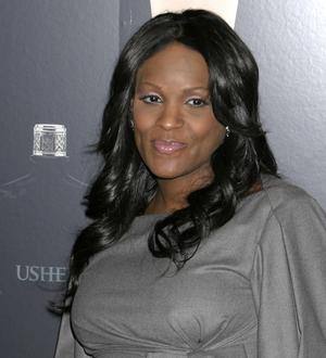 Usher's ex-wife vows to stand firm in custody battle
