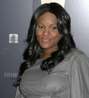 Usher's ex-wife vows to stand firm in custody battle