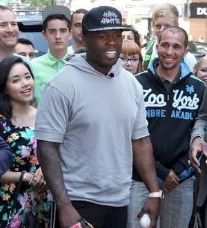 50 Cent eager to tour with Eminem