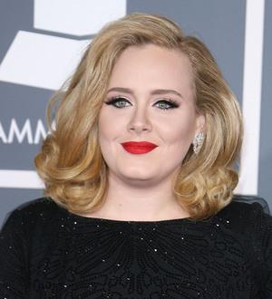Adele snubs 'daunting' Glastonbury gig