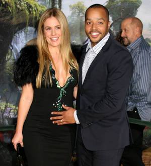 Donald Faison celebrates hit new film with baby boy