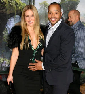 Donald Faison celebrates hit new film with baby boy
