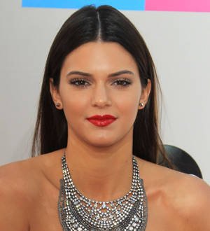 Kendall Jenner bares breasts on the runway