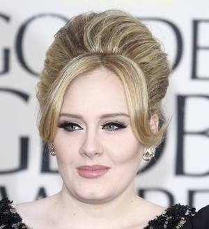 Adele's record-breaking Hello debuts at number one in Britain
