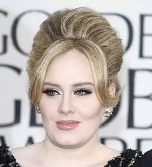 Adele's record-breaking Hello debuts at number one in Britain
