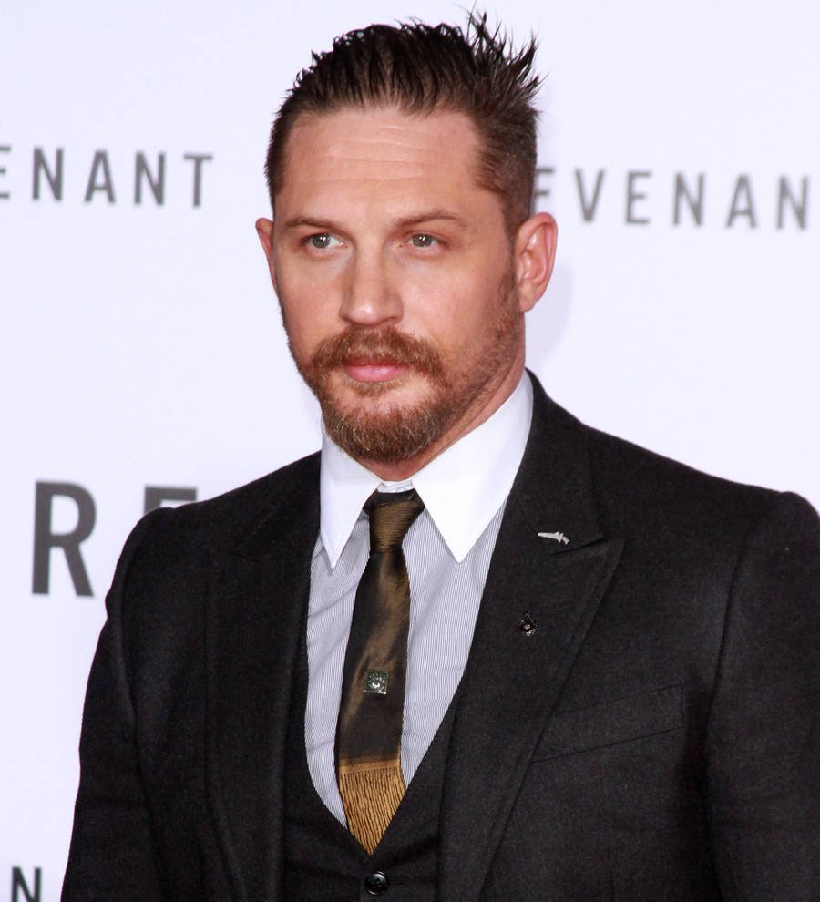 Tom Hardy strips nude for lake swim