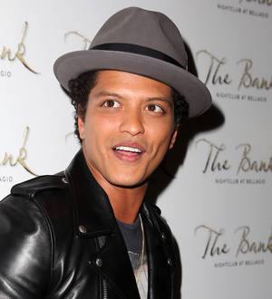 Bruno Mars dines on scorpion kebab