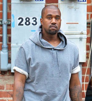 Kanye West throws jab at Ray J during Late Night TV performance